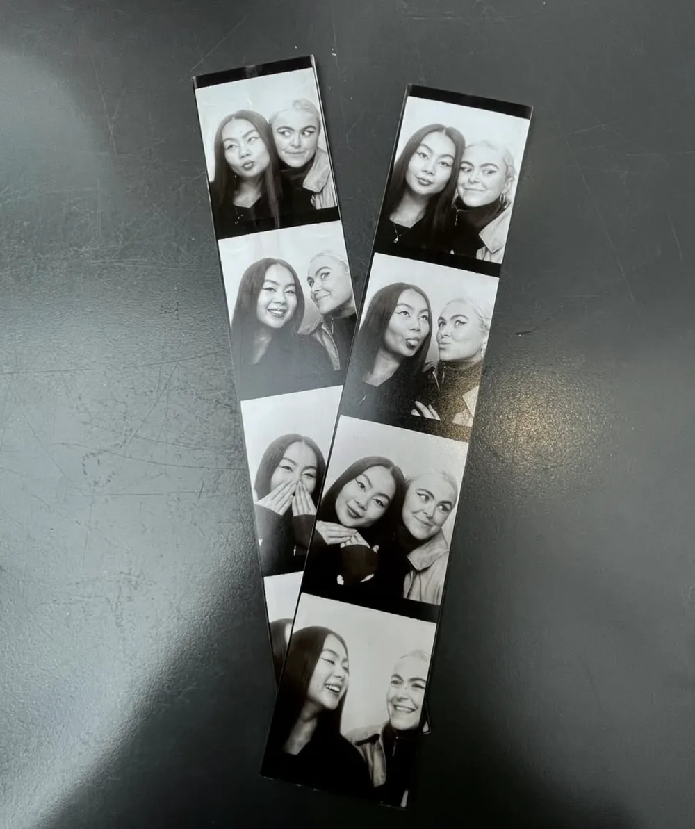 Two black and white photobooth strips of Mickey Jones and a friend pulling faces