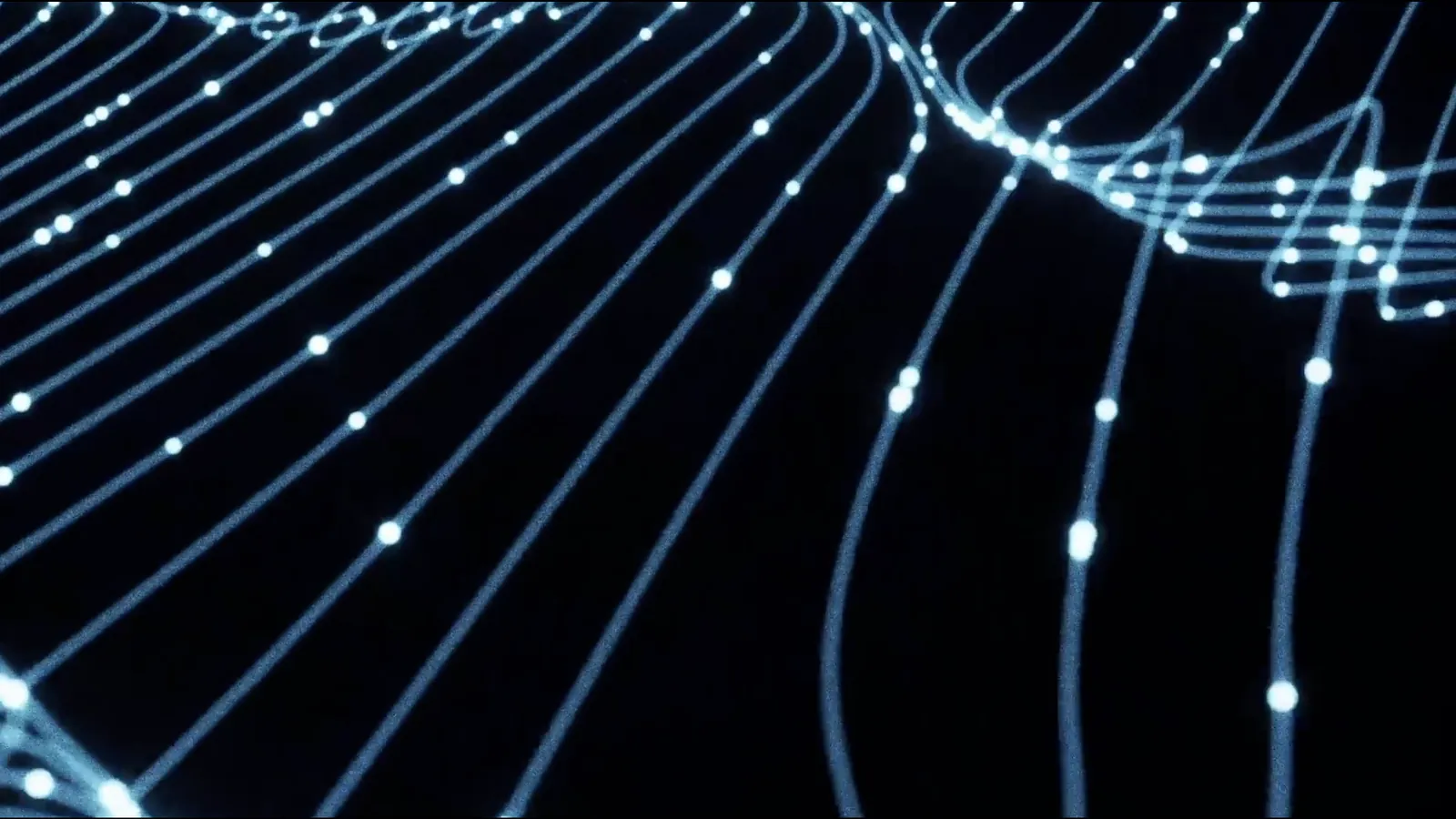 How to stop overanalysing everything: lines of blue light running in parallel, then knotting into a tangle in one corner