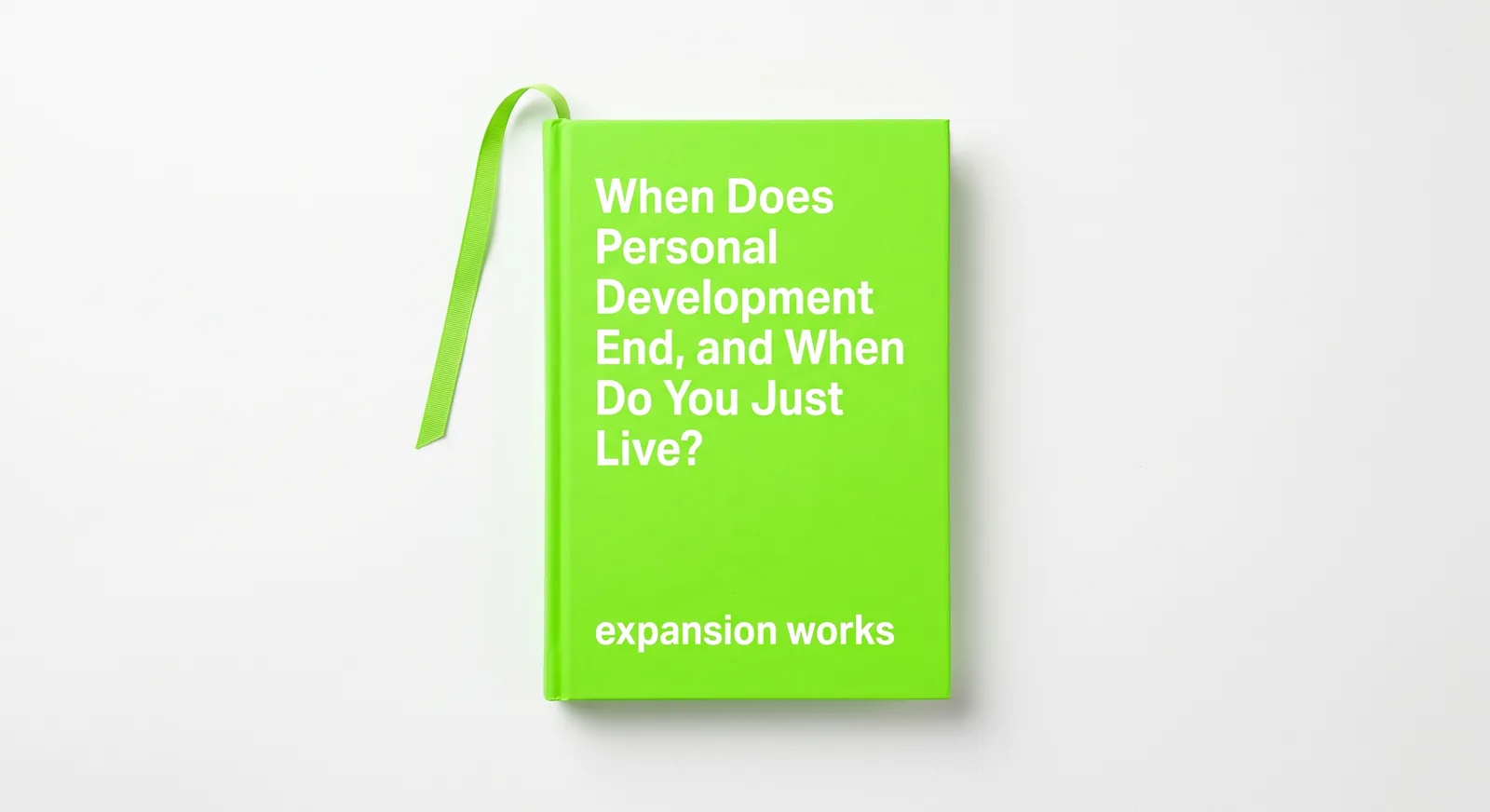 A bright green hardback titled with the article question, its bookmark ribbon resting outside the closed book