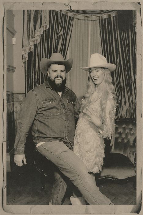 James in a cowboy hat in a sepia photobooth strip